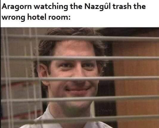 Funny office meme says "Aragorn watching the Nazgul trash the wrong hotel room". Picture of Jake smilliing through the window.