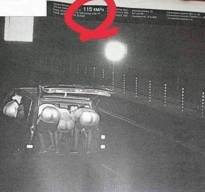 An image taken from a speed camera of a car full of men mooning a speed camera at 115km per hour.